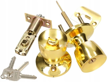 Otočný gombík so zámkom pre krídlové dvere zlato