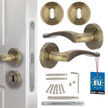 Dverová kľučka vnútorná krátka štítka delená s rozetou na kľúč patina