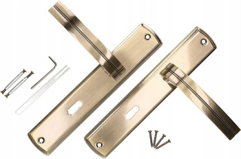 Kľučka dverí na kľúč s dlhým hriadeľom patina 72 mm