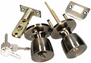 Otočný gombík so zámkom pre krídlové dvere patina